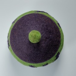 Small green felted pot with embroidery and a purple lid.