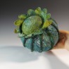 Spherical felt vessel with lacy embroidered panels