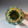 Spherical felt vessel with lacy embroidered panels