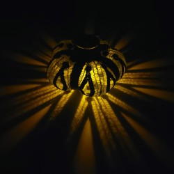 Lit up in the dark - throwing beautiful shadows across the table.