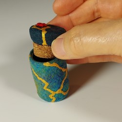 Miniature functional wet-felted Kintsugi jar with fitted lid