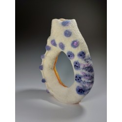 Oval ring vessel in nuno-felted wool, silk, and viscose.