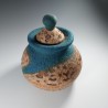 Wet-felted cork-effect pot with turquoise swirls and a lid.