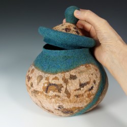 Wet-felted cork-effect pot with turquoise swirls and a lid.