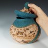 Wet-felted cork-effect pot with turquoise swirls and a lid.