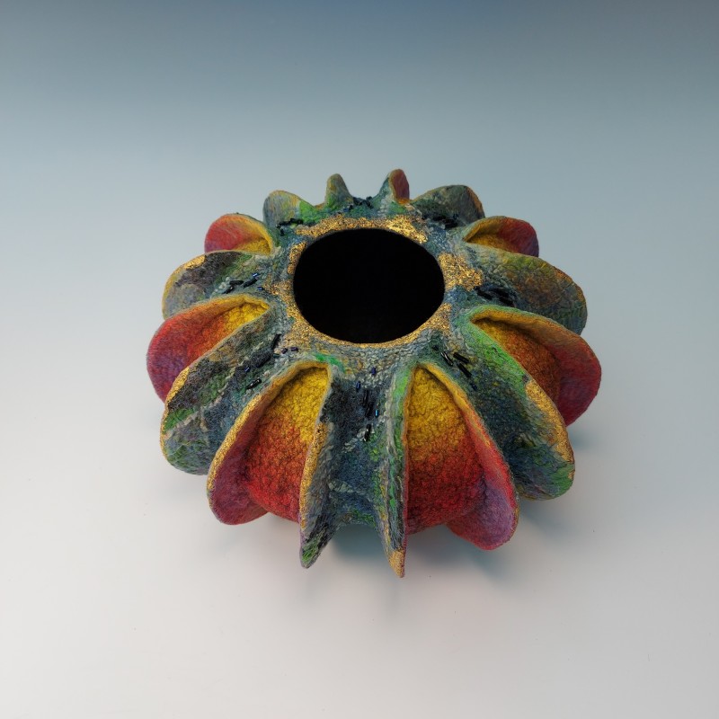 Chromatic Curves - a colourful nuno-felted, finned vessel embellished with 24ct gold leaf and glass beads.