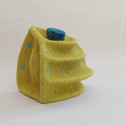 Wet-felted quadrant vessel with folds and a stopper
