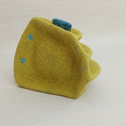 Wet-felted quadrant vessel with folds and a stopper